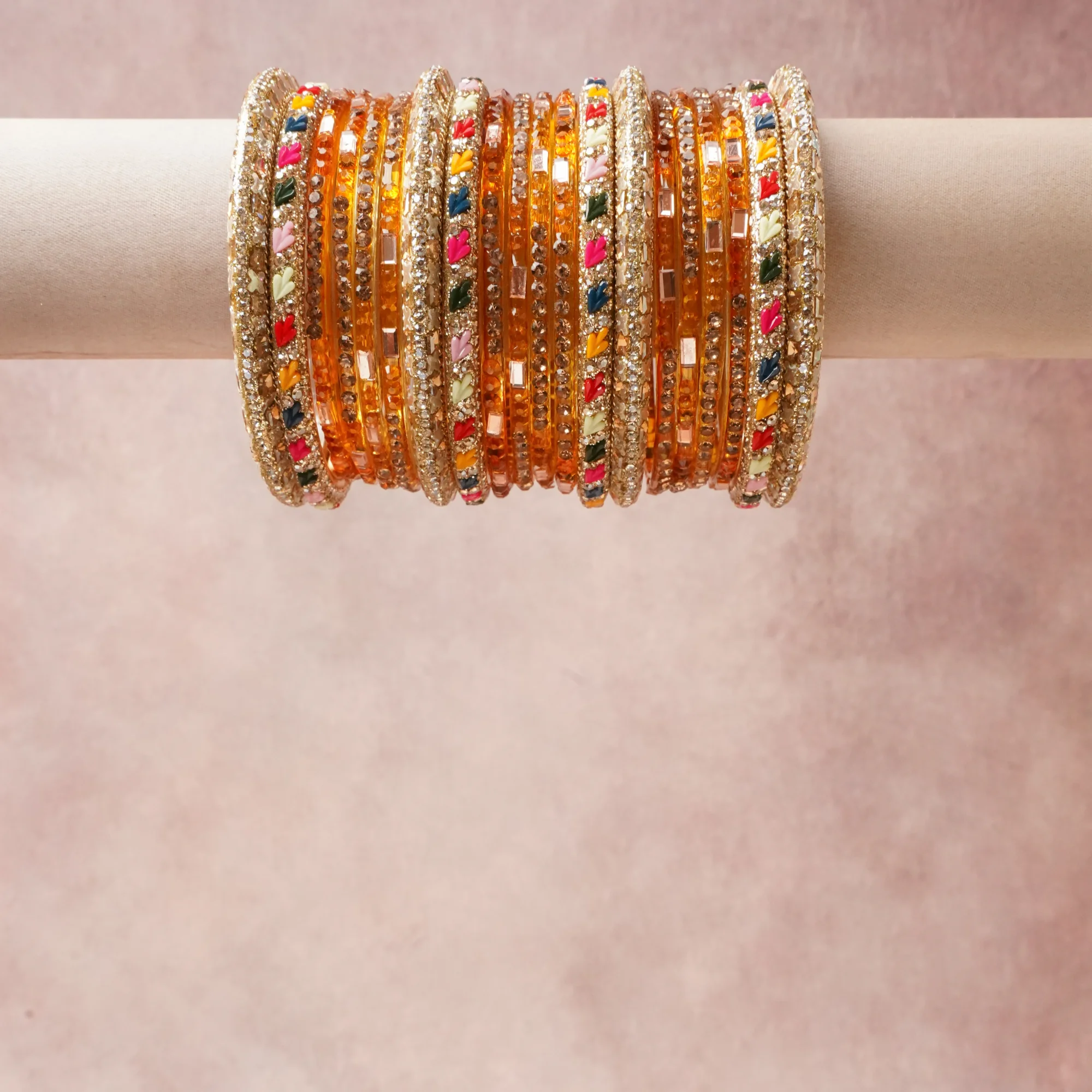 A commanding Multi colour anchors this beautiful set, enriched with accents of Crimson Red, Cream White, Rose Pink, Indigo Blue, Orange, Mint Green that add depth and dimension.

Featuring a striking composition of Glass, Gold-toned Metal, Enamel, Clear Rhinestones, this set carries intricate craftsmanship and strong presence. Grand in form, it is created for moments that deserve to be marked.